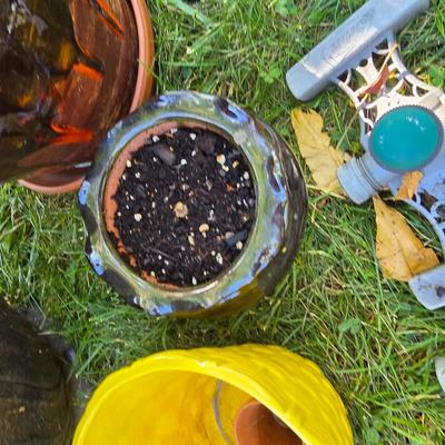 Flowerpots and Sprinklers with a brass plant stand