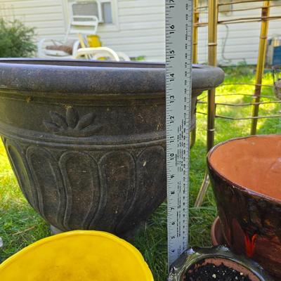 Flowerpots and Sprinklers with a brass plant stand