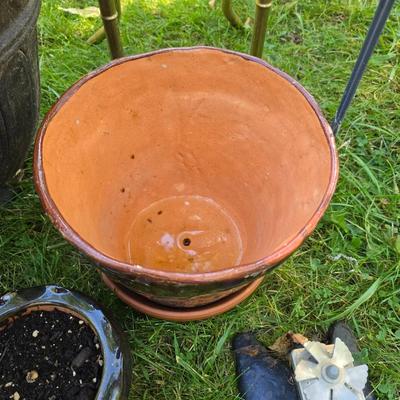 Flowerpots and Sprinklers with a brass plant stand