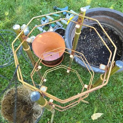 Flowerpots and Sprinklers with a brass plant stand