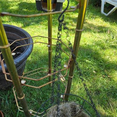 Flowerpots and Sprinklers with a brass plant stand