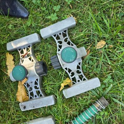 Flowerpots and Sprinklers with a brass plant stand