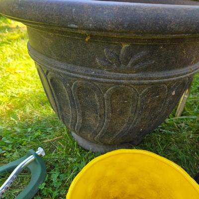 Flowerpots and Sprinklers with a brass plant stand