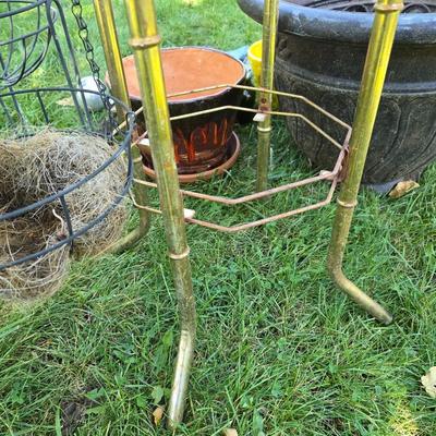 Flowerpots and Sprinklers with a brass plant stand
