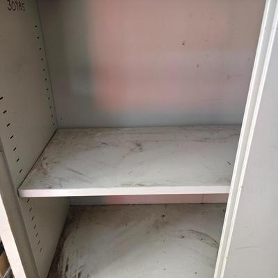 Metal storage cabinet with sliding doors