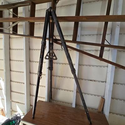 Antique wooden tripod with antique wooden ladder