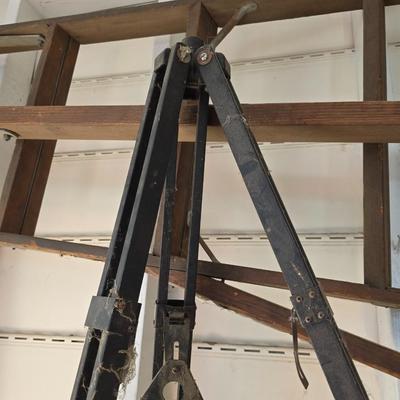 Antique wooden tripod with antique wooden ladder