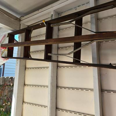 Antique wooden tripod with antique wooden ladder