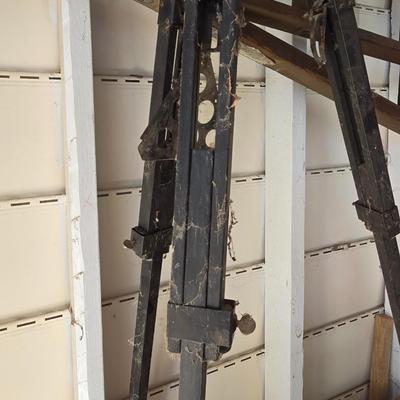 Antique wooden tripod with antique wooden ladder