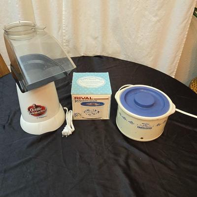 Orville Redenbacher's popcorn maker and two small electric Crockpots