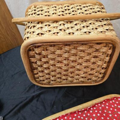 Wicker picnic basket with plastic plates - Melmac like plates - flatware and a can opener