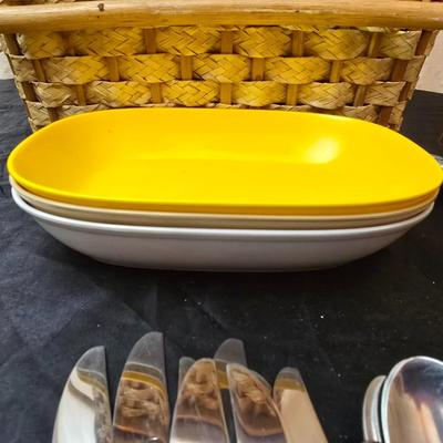 Wicker picnic basket with plastic plates - Melmac like plates - flatware and a can opener