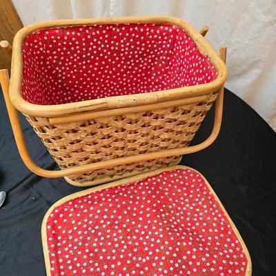 Wicker picnic basket with plastic plates - Melmac like plates - flatware and a can opener