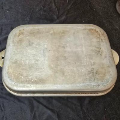 Metal baking pans and cookie sheets with measuring cups - sweet sweet baking!