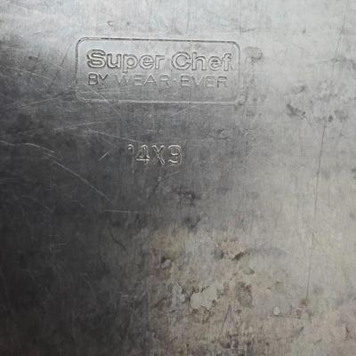 Metal baking pans and cookie sheets with measuring cups - sweet sweet baking!