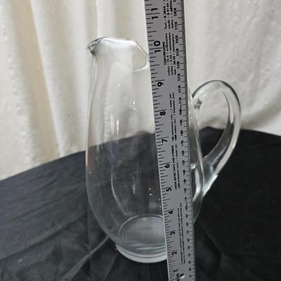 Large clear glass water pitcher with 6 stemmed glasses