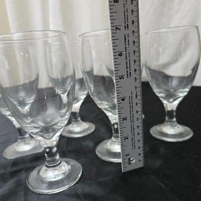 Large clear glass water pitcher with 6 stemmed glasses