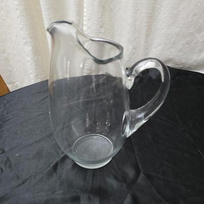 Large clear glass water pitcher with 6 stemmed glasses