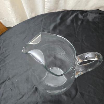 Large clear glass water pitcher with 6 stemmed glasses