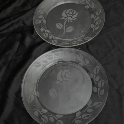 Etched rose and grapes glass plates with assortment of bowls and mugs