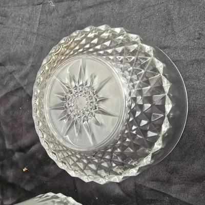Etched rose and grapes glass plates with assortment of bowls and mugs