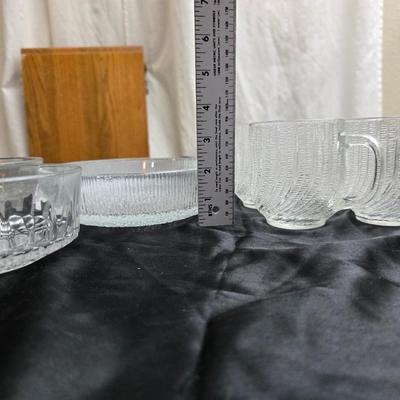 Etched rose and grapes glass plates with assortment of bowls and mugs