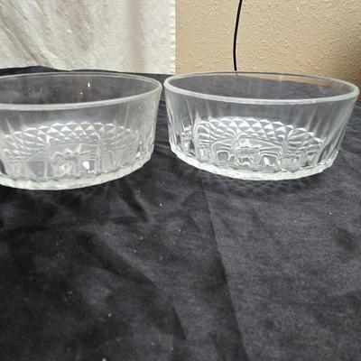 Etched rose and grapes glass plates with assortment of bowls and mugs