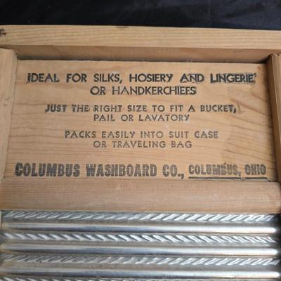Two vintage washboards - one glass - one metal