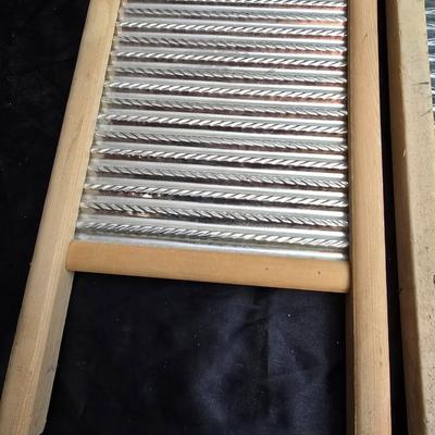 Two vintage washboards - one glass - one metal