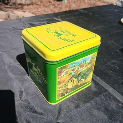 JOHN DEERE MODEL G TRACTOR CLOCK AND A TIN