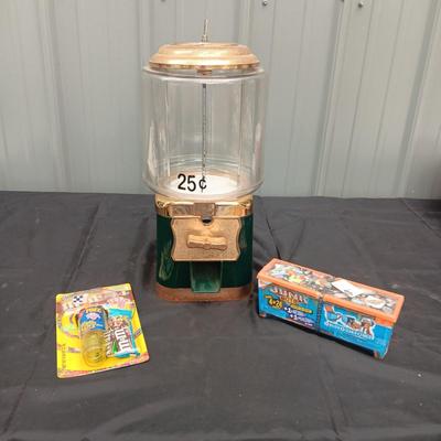 COIN OPERATED CANDY DISPENSER WITH KEY