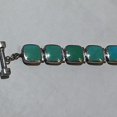 Vintage Acleoni Classic Southwest Turquoise 7-8" Adjustable Bracelet Color Varies from a Clear Powder Blue to a Bluish/Green...