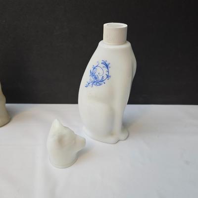 Avon Collectible cat cologn bottles and a cute cat tape measure - also Avon