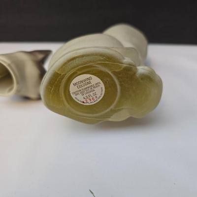Avon Collectible cat cologn bottles and a cute cat tape measure - also Avon
