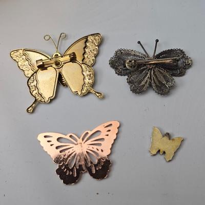 Butterfly brooch pins, necklace, keychain, windchimes, flower bouquet and more