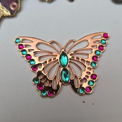 Butterfly brooch pins, necklace, keychain, windchimes, flower bouquet and more