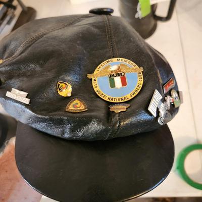 Black Leather Motorcycle Hat with Collectible Pins for 80's ,Moto Guzzi, Ford 1933 34 model 40, Triumph, AMA Pins, and others