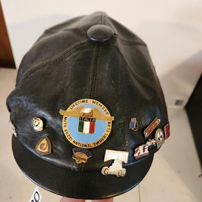 Black Leather Motorcycle Hat with Collectible Pins for 80's ,Moto Guzzi, Ford 1933 34 model 40, Triumph, AMA Pins, and others