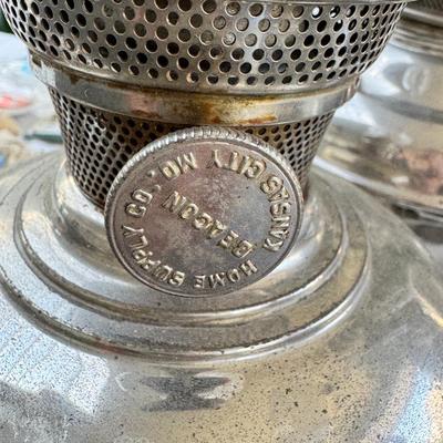 Antique oil lamps, chimneys, burners, wicks