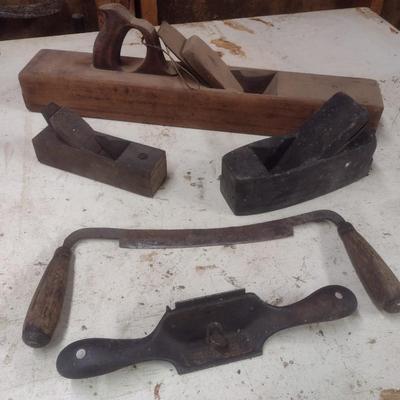 Collection of Antique and Vintage Wood Shaping Tools Includes Hand Planes and Draw Knife