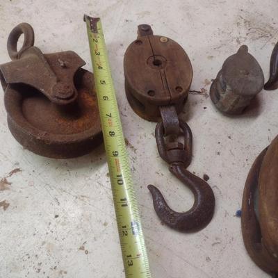 Collection of Vintage Various Sized Barn Pulleys Choice A