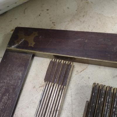 Collection of Vintage Carpenter's Measuring Tools and Squares