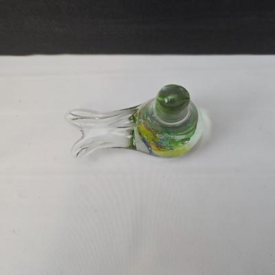 Blown glass bird and a clear glass squirrel candle holder