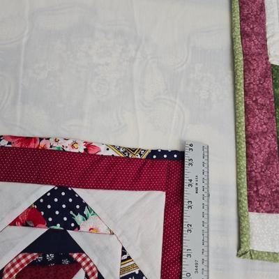 Collection of quilted fabrics - wall hanging - pillow case - table runner - and more