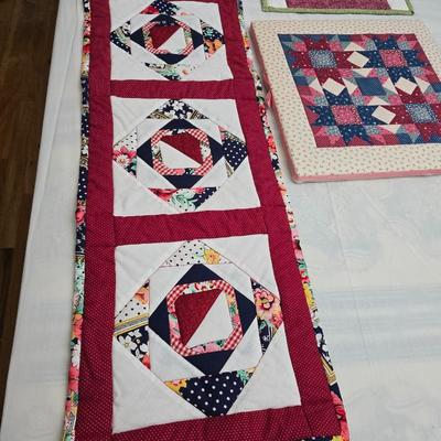 Collection of quilted fabrics - wall hanging - pillow case - table runner - and more