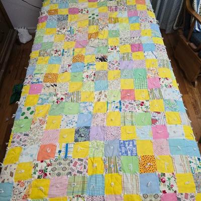 Beautiful vintage handmade quilt with colored patchwork