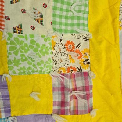 Beautiful vintage handmade quilt with colored patchwork