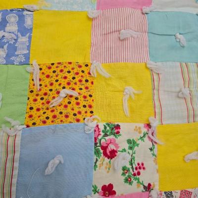 Beautiful vintage handmade quilt with colored patchwork