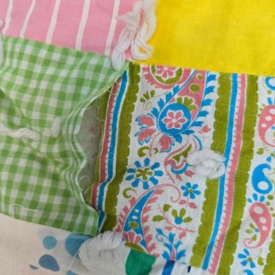 Beautiful vintage handmade quilt with colored patchwork