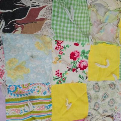 Beautiful vintage handmade quilt with colored patchwork